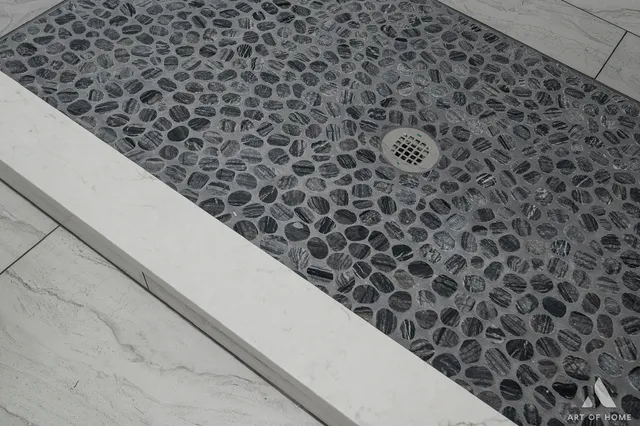 a view of a room with wooden floor and a sink