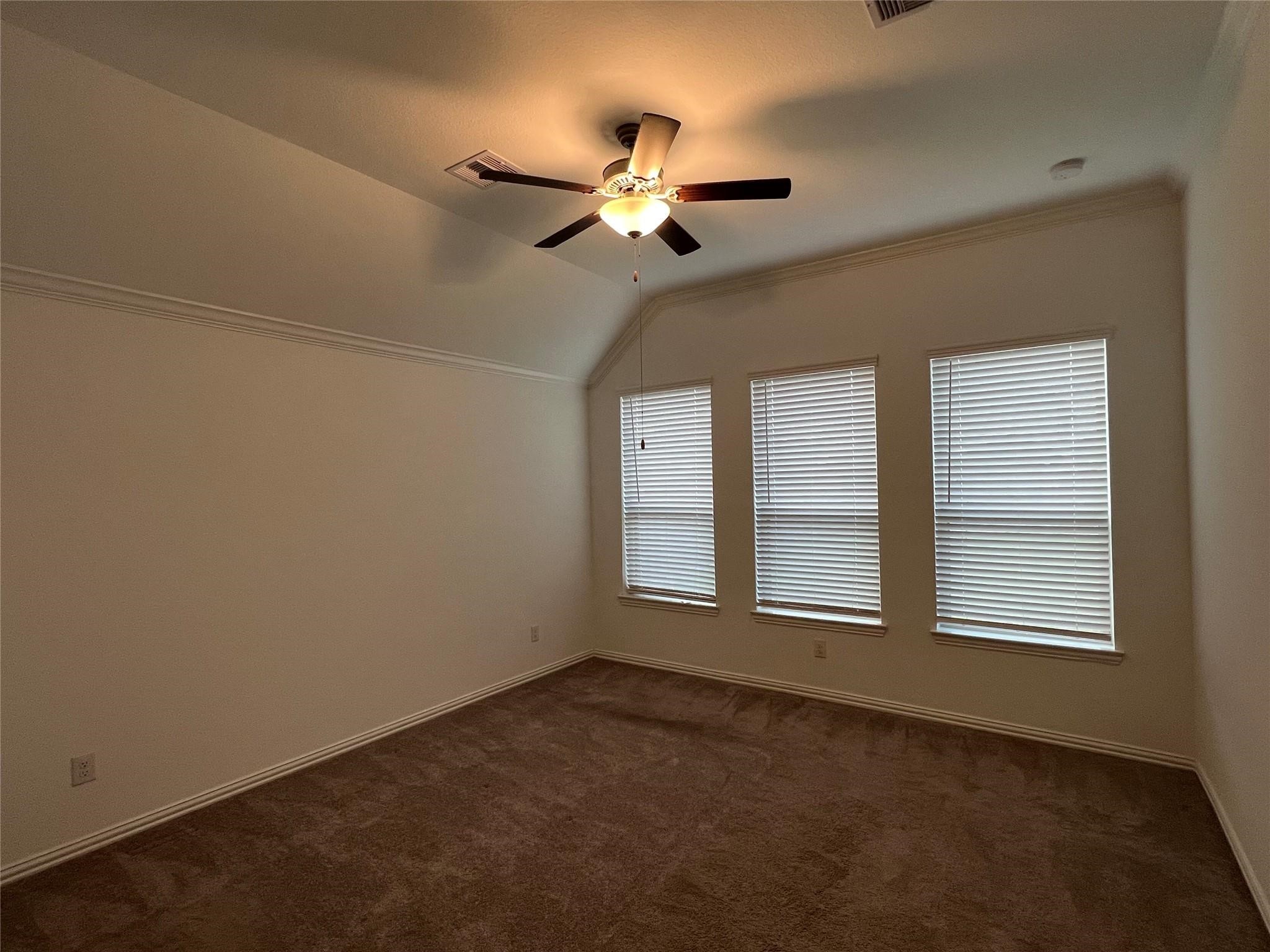 21015 Morning Nectar Lane Cypress, TX 77433 - Photo 21 of 34 a view of an empty room with a window