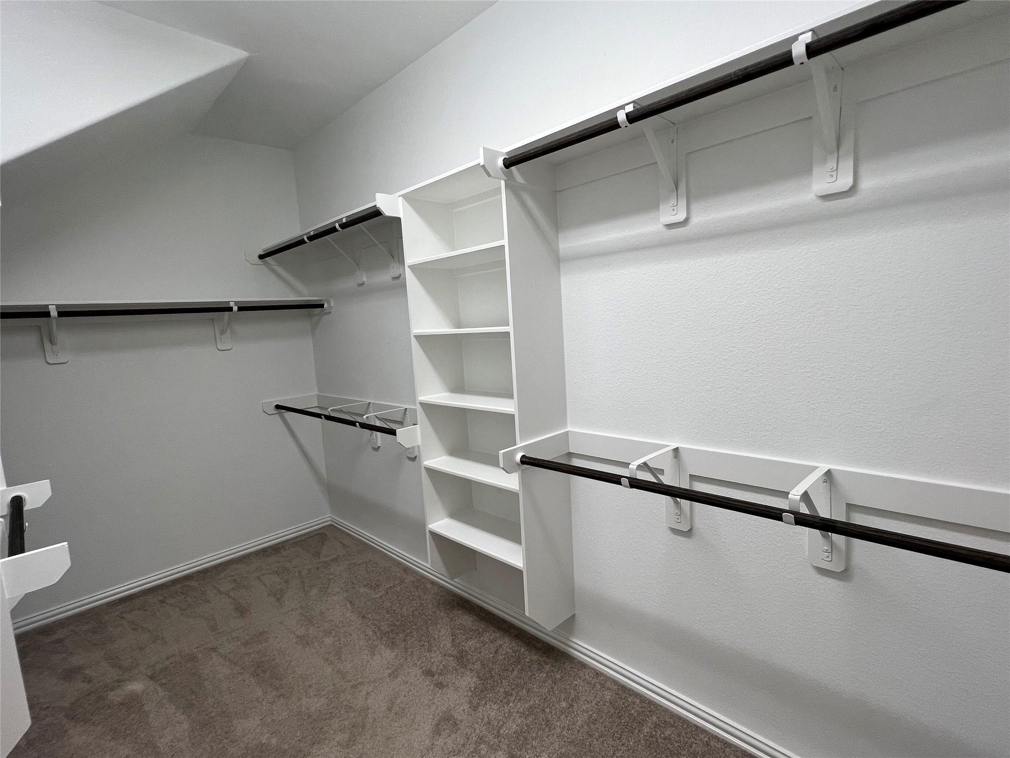 21015 Morning Nectar Lane Cypress, TX 77433 - Photo 24 of 34 a view of a room with racks on the wall