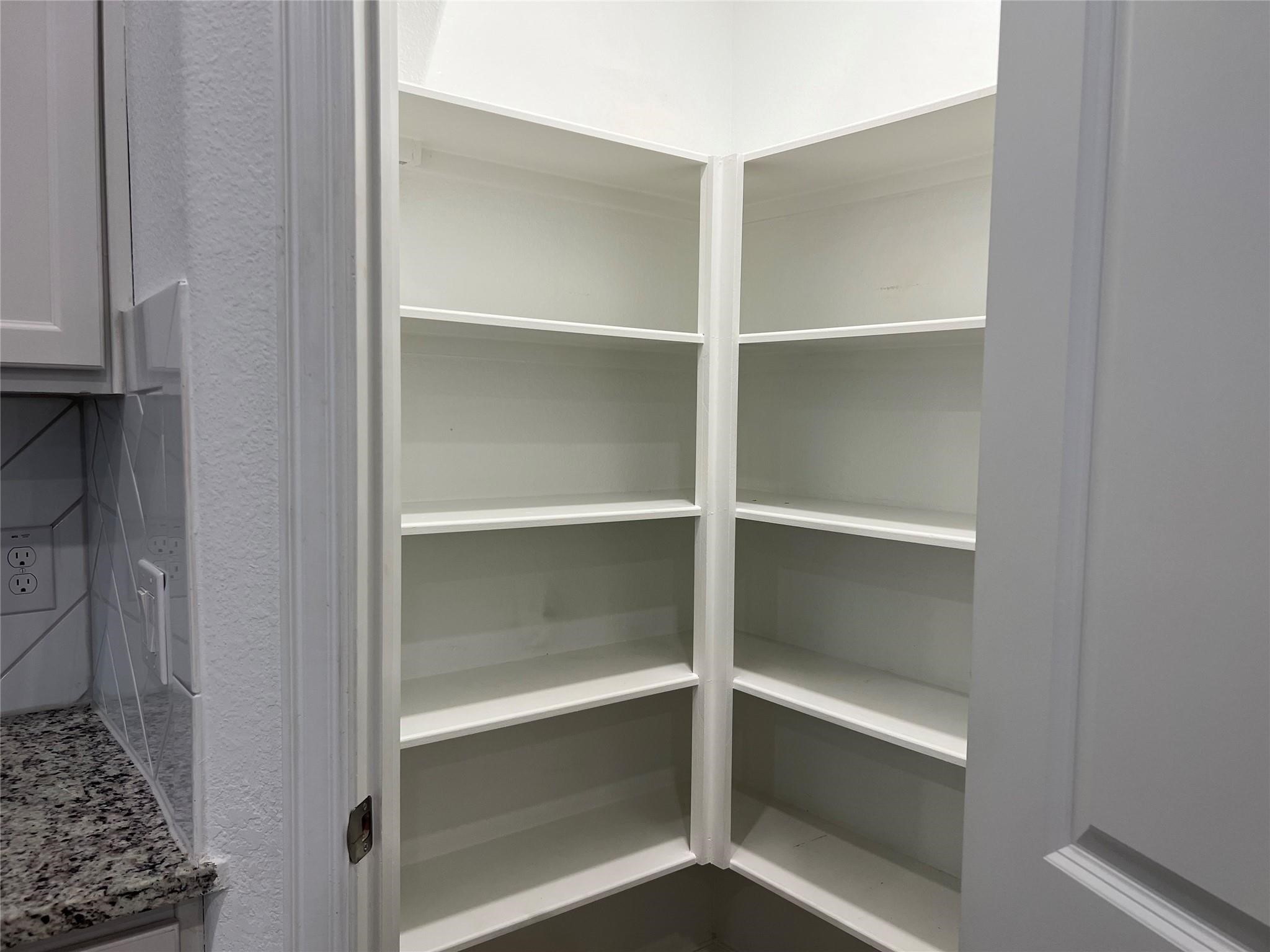 21015 Morning Nectar Lane Cypress, TX 77433 - Photo 7 of 34 a view of walk in closet with empty racks