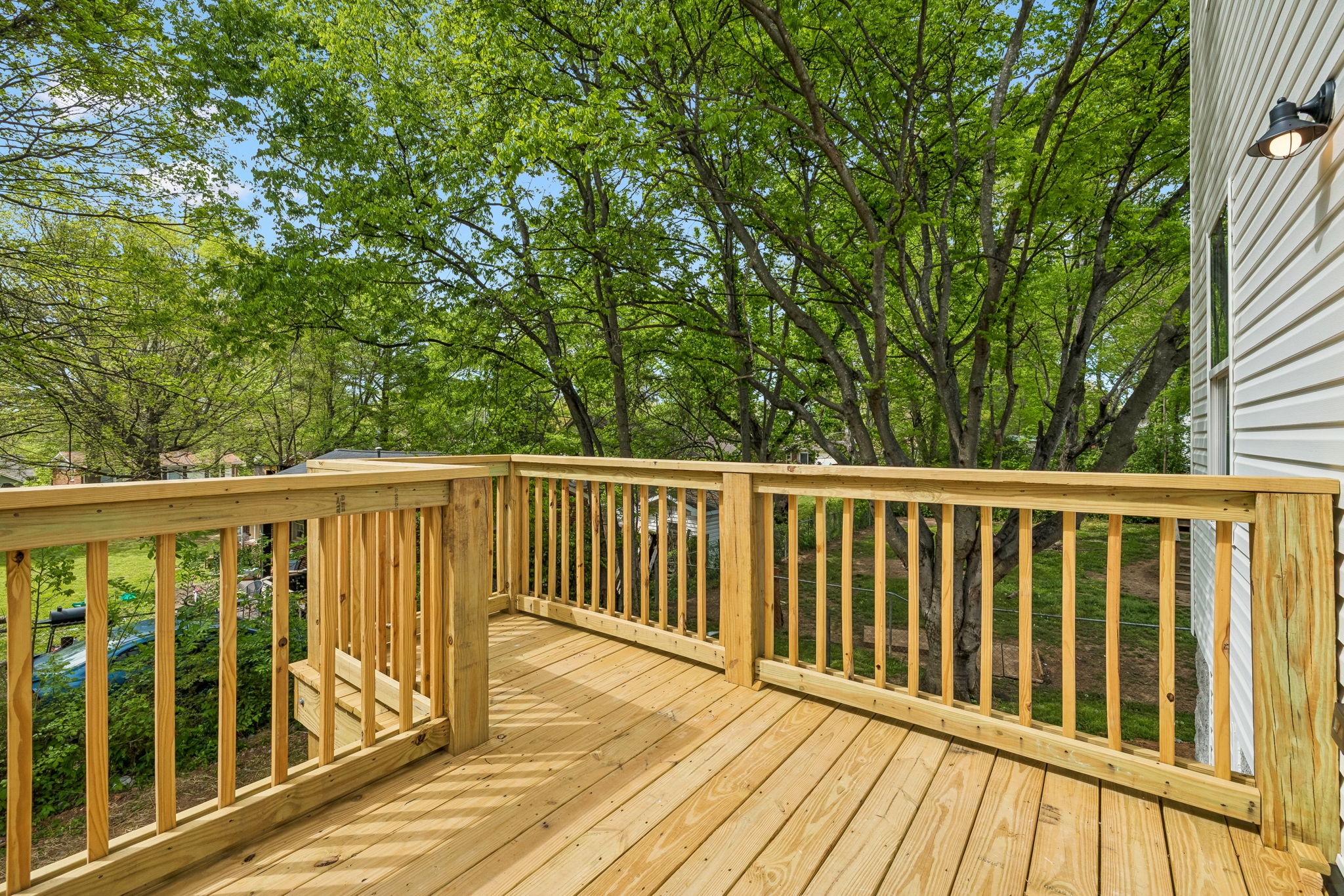 419 North Mabel Street Springfield, TN 37172 - Photo 31 of 34 a balcony with wooden floor and fence