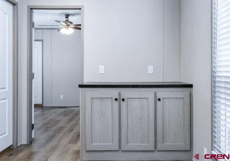 62650 Lasalle Road, Unit 317 Montrose, CO 81403 - Photo 19 of 23 a view of a room with wooden floor