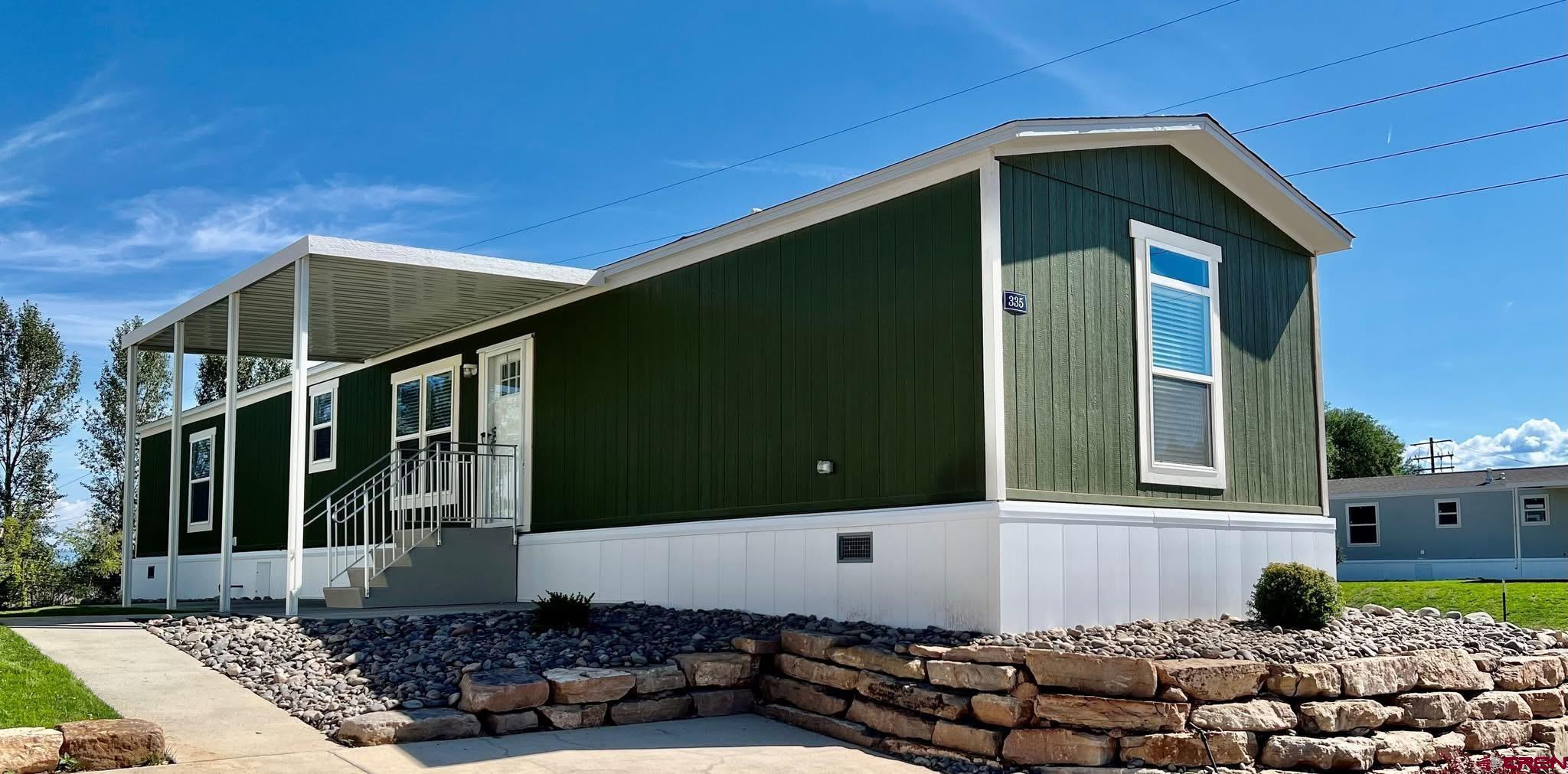 62650 Lasalle Road, Unit 317 Montrose, CO 81403 - Photo 23 of 23 a front view of a house