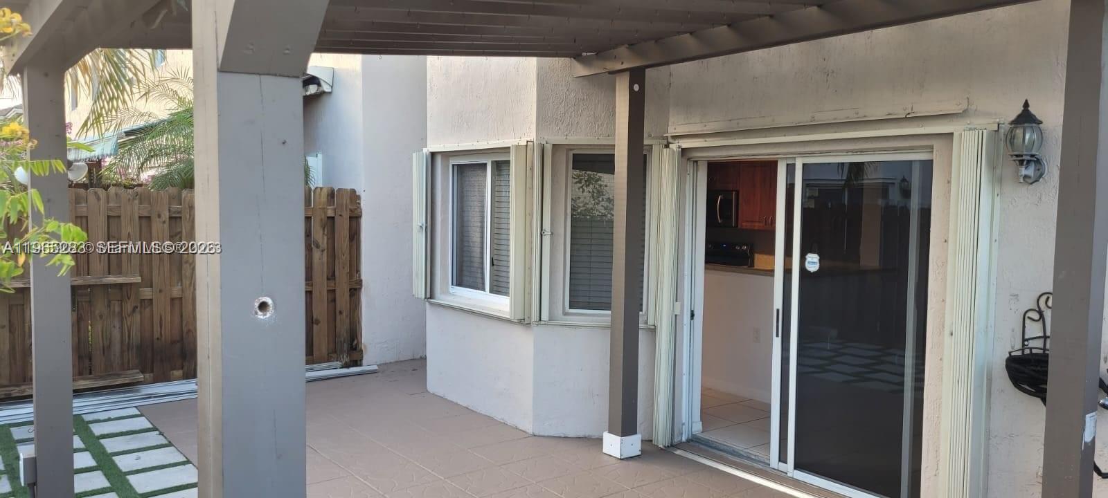 8331 Southwest 124th Avenue, Unit 10114 Miami, FL 33183 - Photo 19 of 19 a view of a front door of the house