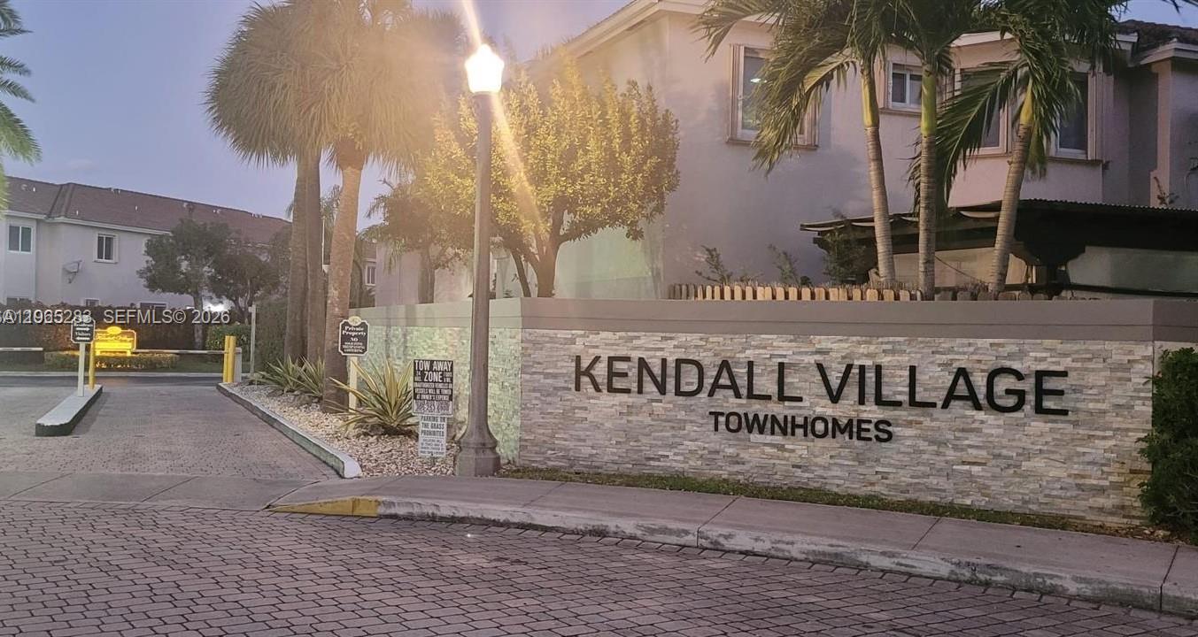 8331 Southwest 124th Avenue, Unit 10114 Miami, FL 33183 - Photo 3 of 19 a view of street with sign board