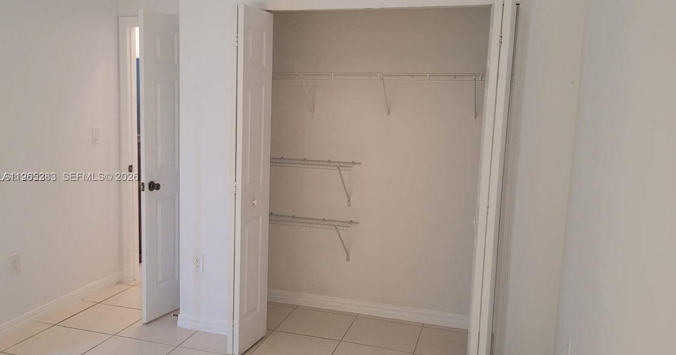 8331 Southwest 124th Avenue, Unit 10114 Miami, FL 33183 - Photo 8 of 19 a bathroom with a shower