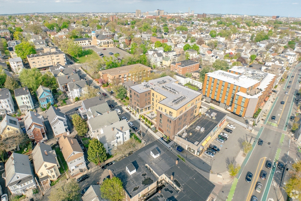 9 Central Street, Unit 207 Somerville, MA 02143 - Photo 31 of 32 an aerial view of residential building with parking