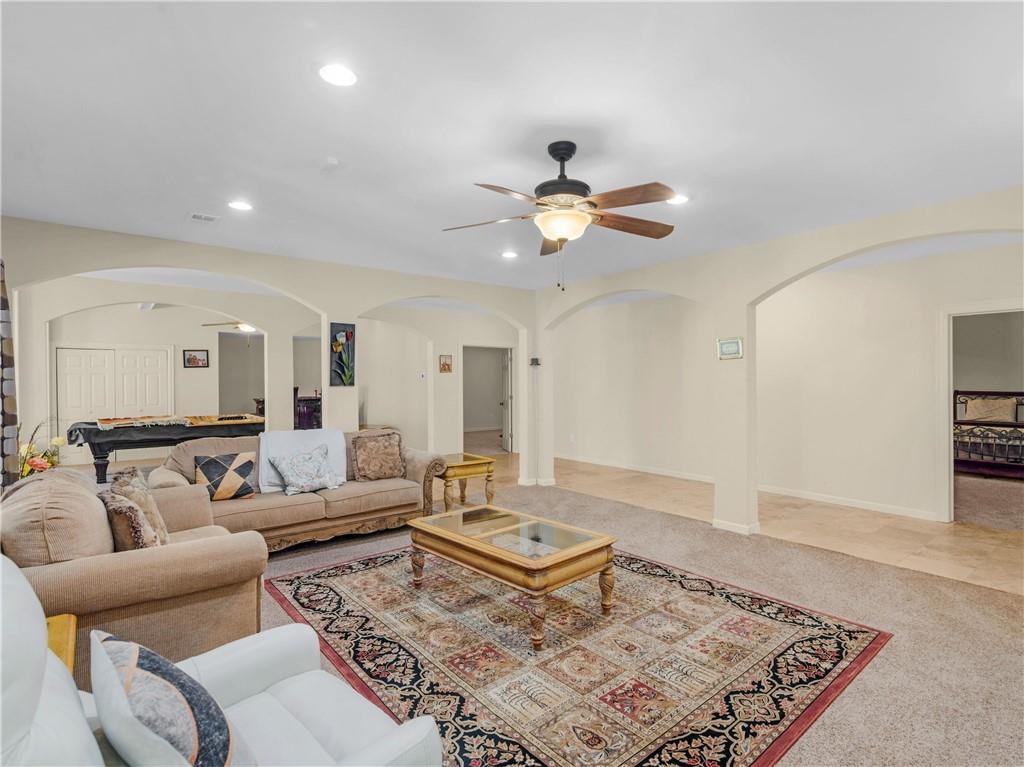 1695 Whitley Road Dacula, GA 30019 - Photo 106 of 153 a living room with furniture and a rug