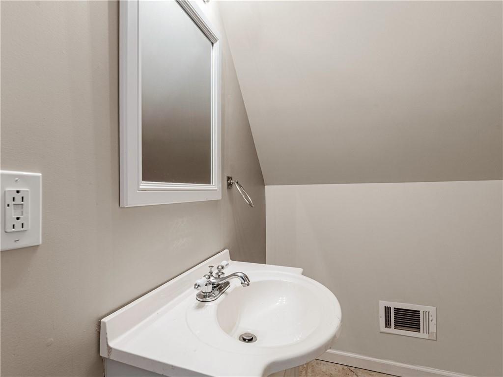 1695 Whitley Road Dacula, GA 30019 - Photo 11 of 153 a bathroom with a sink and a mirror