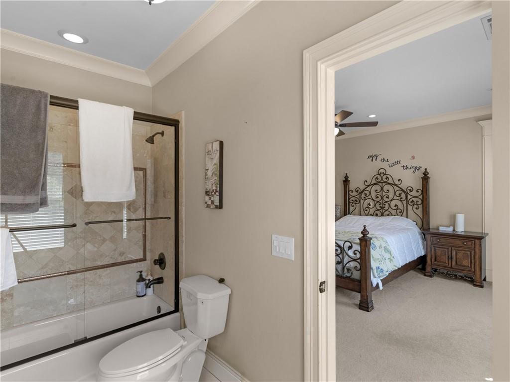 1695 Whitley Road Dacula, GA 30019 - Photo 132 of 153 a bathroom with a toilet and a shower