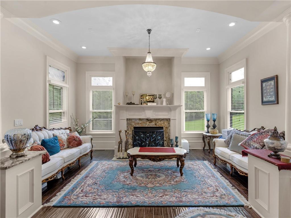 1695 Whitley Road Dacula, GA 30019 - Photo 49 of 153 a living room with furniture and a fireplace