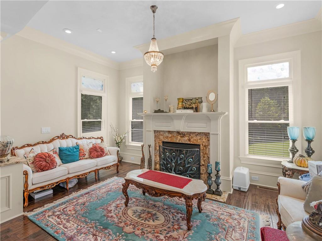 1695 Whitley Road Dacula, GA 30019 - Photo 61 of 153 a living room with furniture and a fireplace