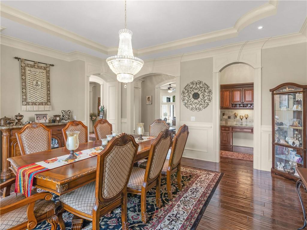 1695 Whitley Road Dacula, GA 30019 - Photo 67 of 153 a view of a a dining room with furniture window and wooden floor