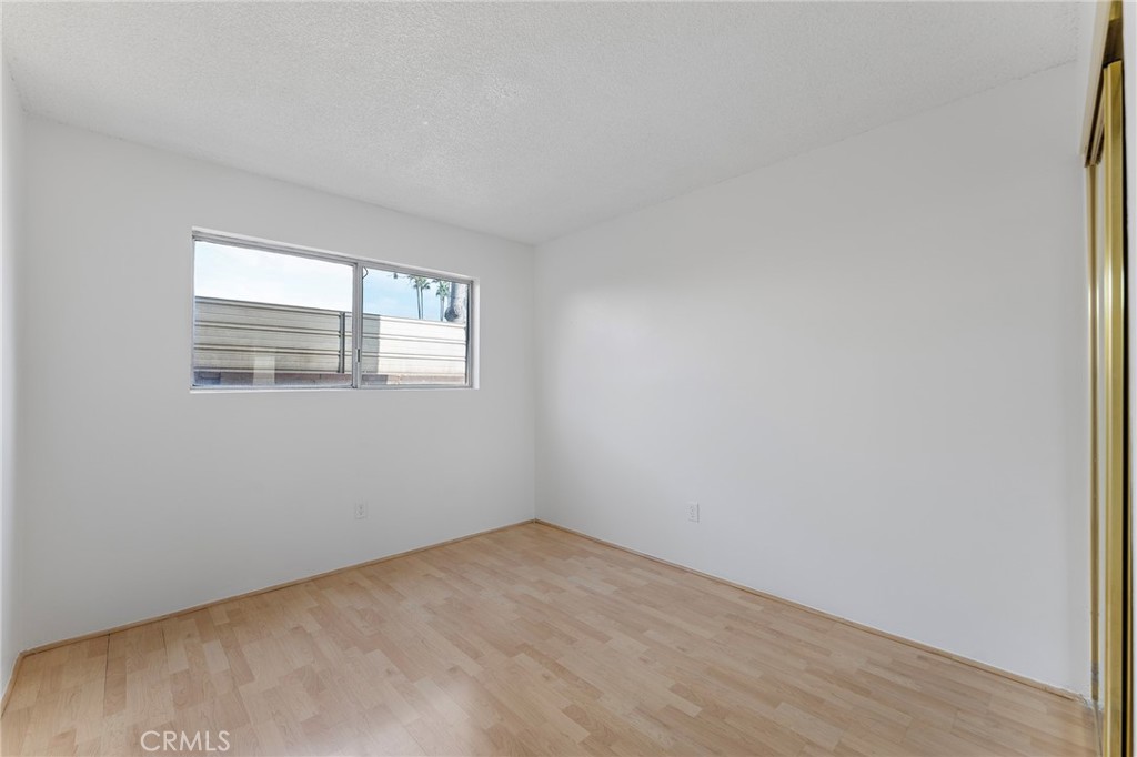 807 East Calbas Street Carson, CA 90745 - Photo 14 of 31 an empty room with windows