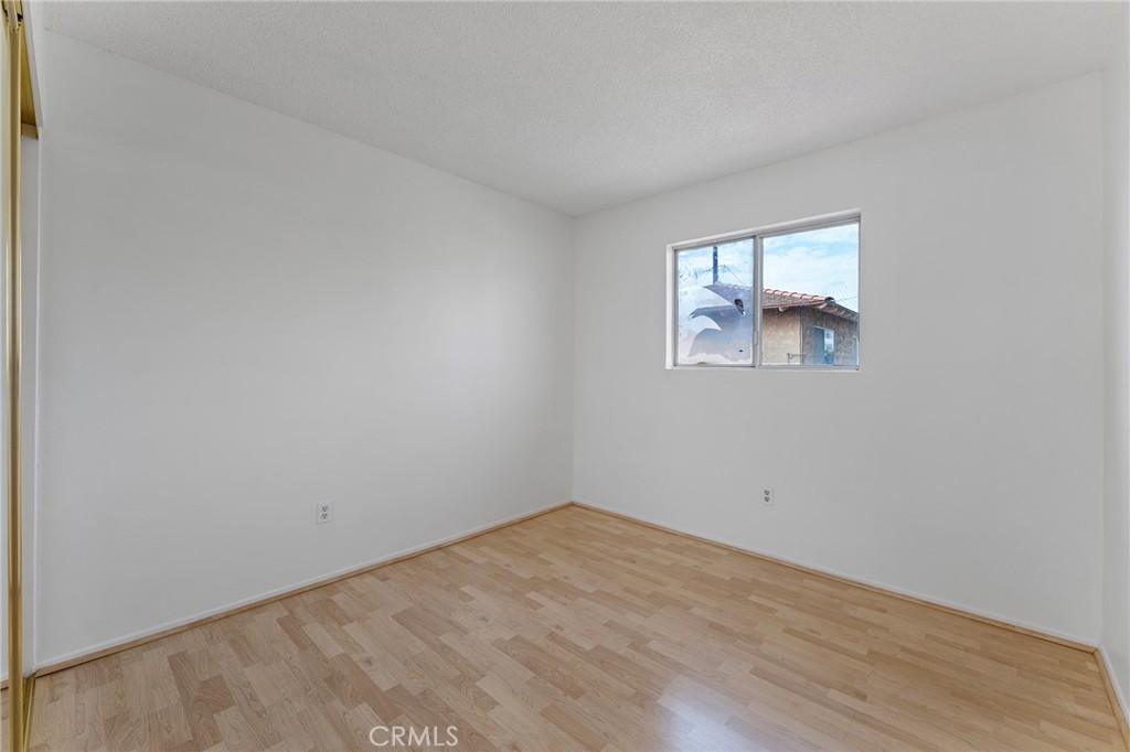807 East Calbas Street Carson, CA 90745 - Photo 20 of 31 an empty room with windows