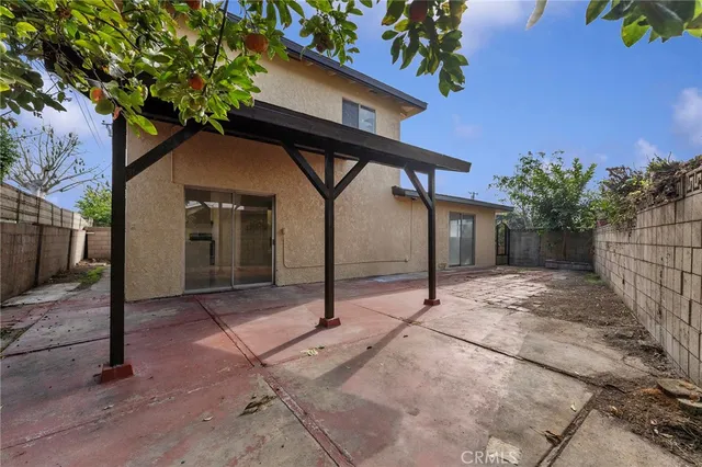 a house view with a backyard space