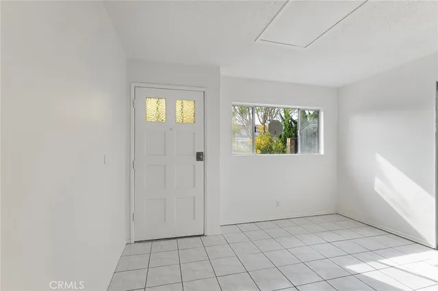 an empty room that has a window