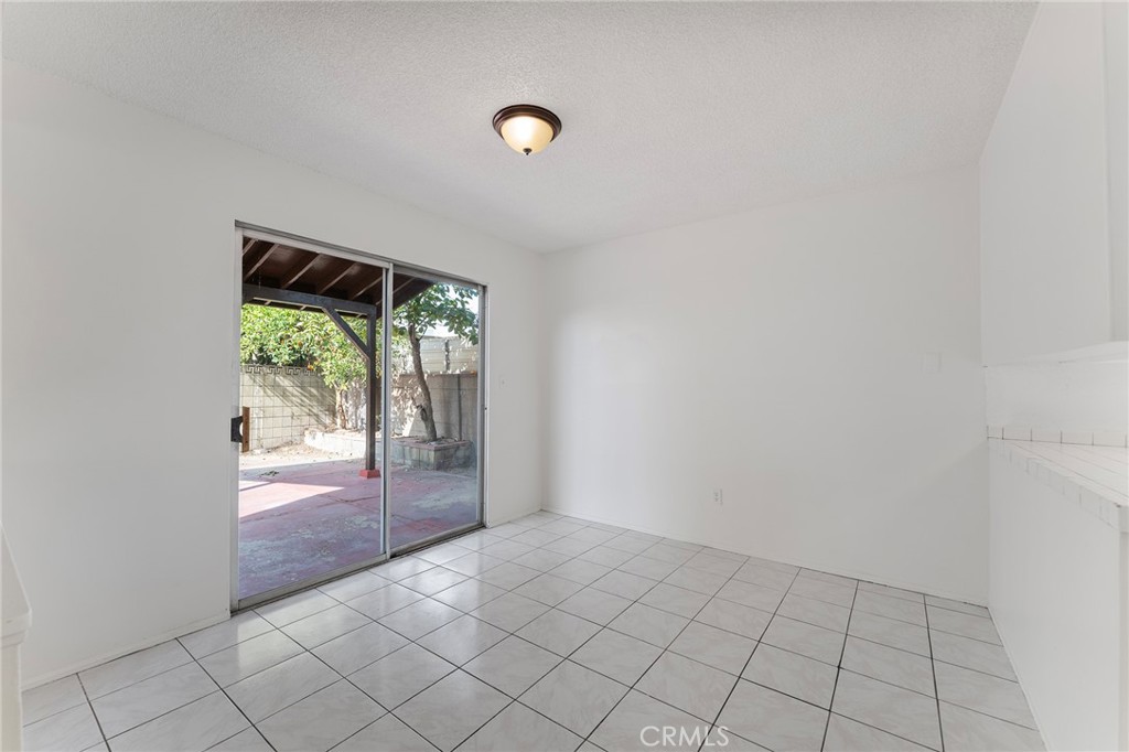 807 East Calbas Street Carson, CA 90745 - Photo 10 of 31 an empty room with windows
