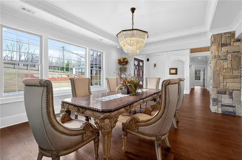 a view of a dinning table and chairs in the roof deck