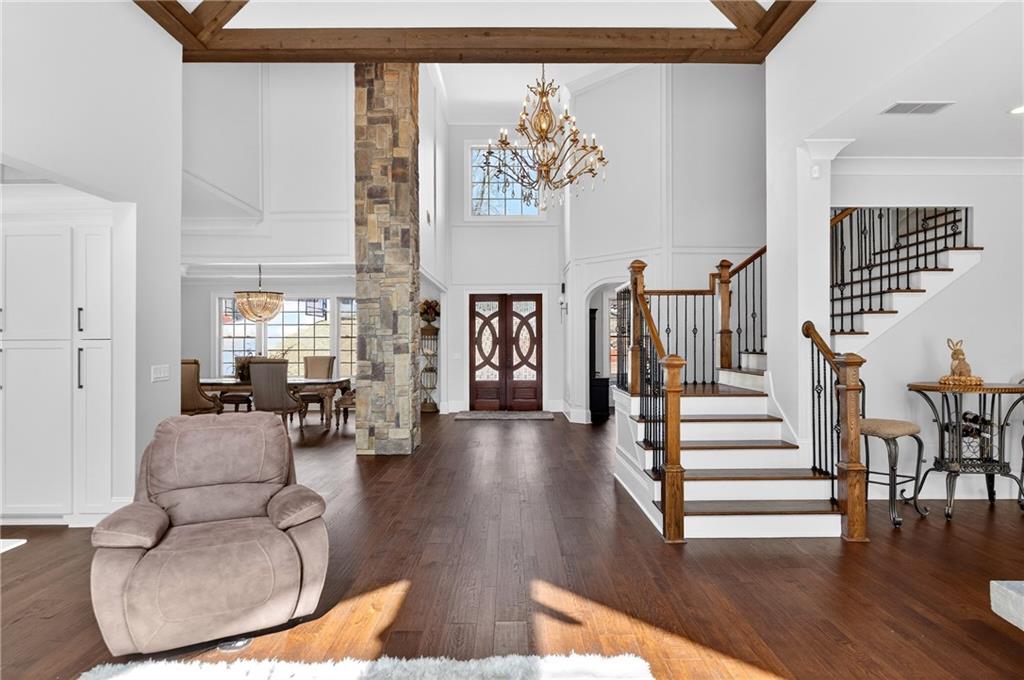 3944 Hamilton Mill Road Buford, GA 30519 - Photo 27 of 55 a living room with furniture and wooden floor