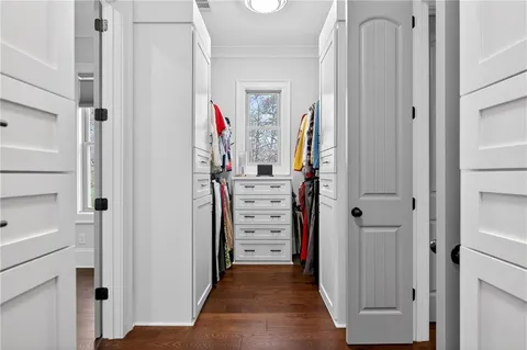 a bathroom with a mirror and a shower