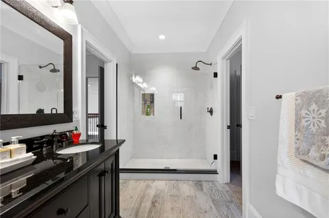 a view of a house with swimming pool and sitting area