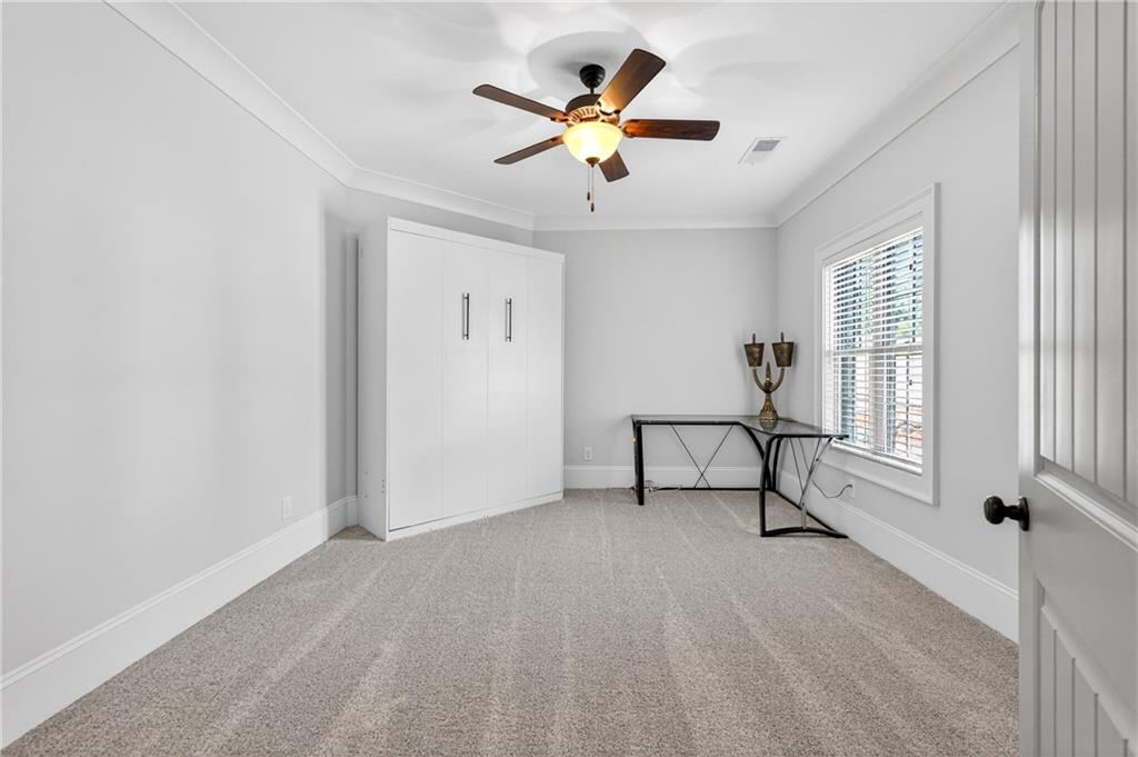 3944 Hamilton Mill Road Buford, GA 30519 - Photo 44 of 55 a view of an empty room with a window