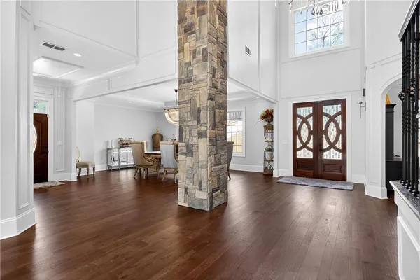 a living room with furniture fireplace and a flat screen tv