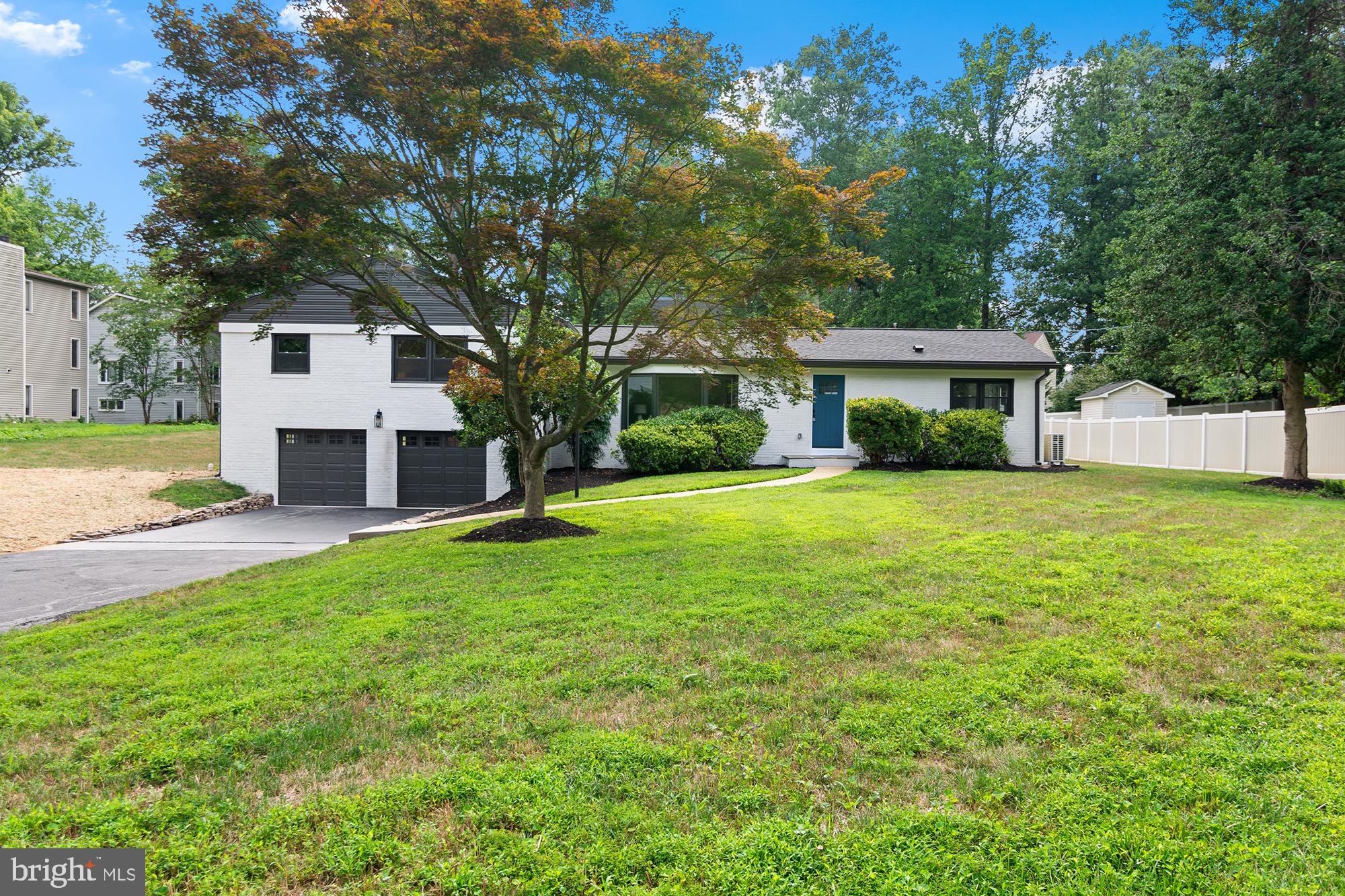 14200 Dav Road Rockville, MD 20850 - Photo 4 of 60 Charming home with lush green yard.