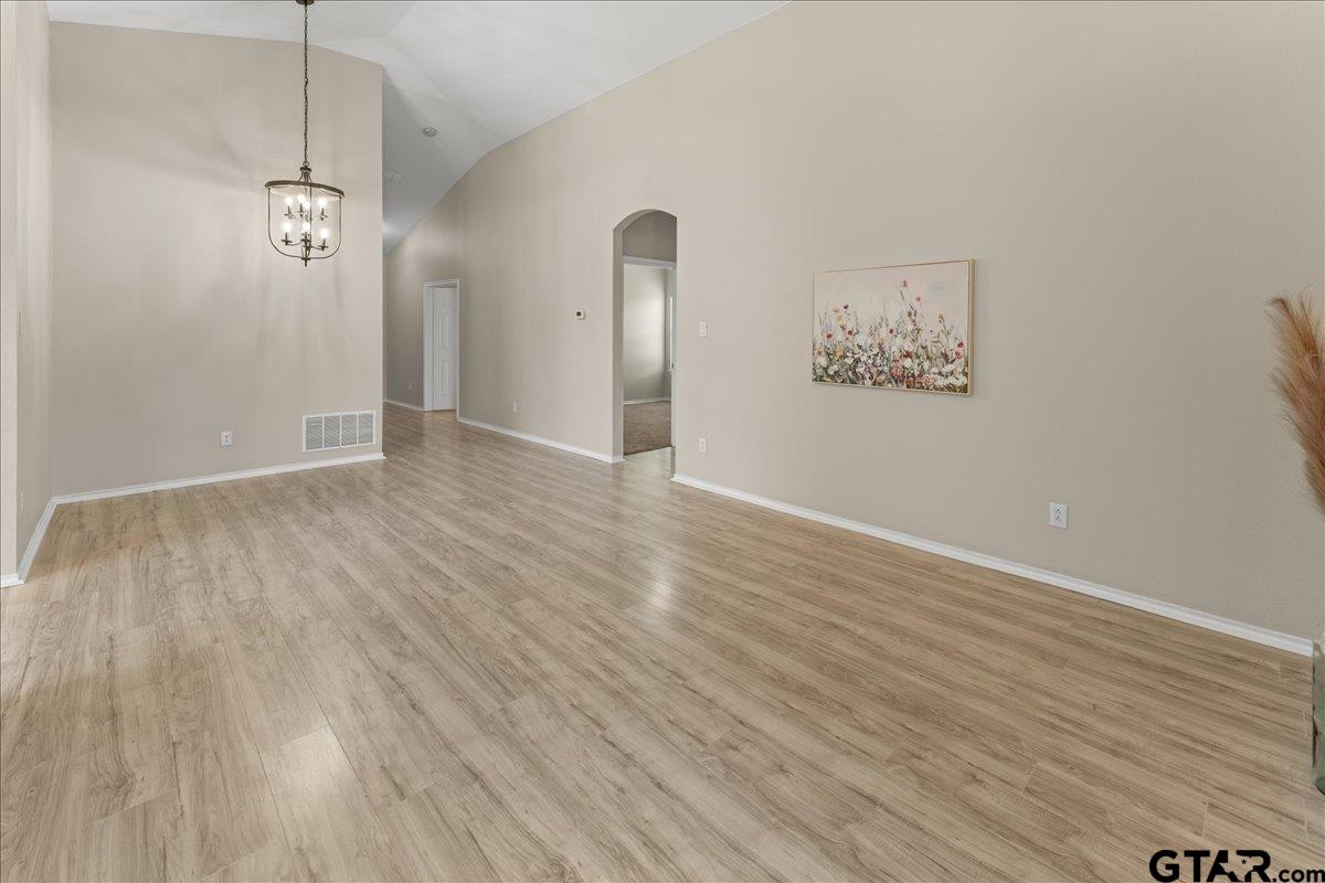 205 Freedom Trail Forney, TX 75126 - Photo 12 of 41 a view of a hallway with wooden floor