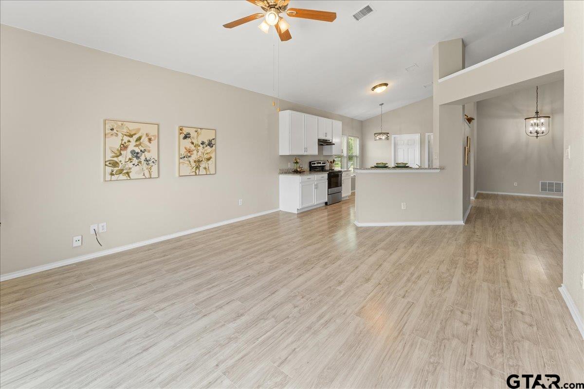 205 Freedom Trail Forney, TX 75126 - Photo 13 of 41 a view of empty room with wooden floor