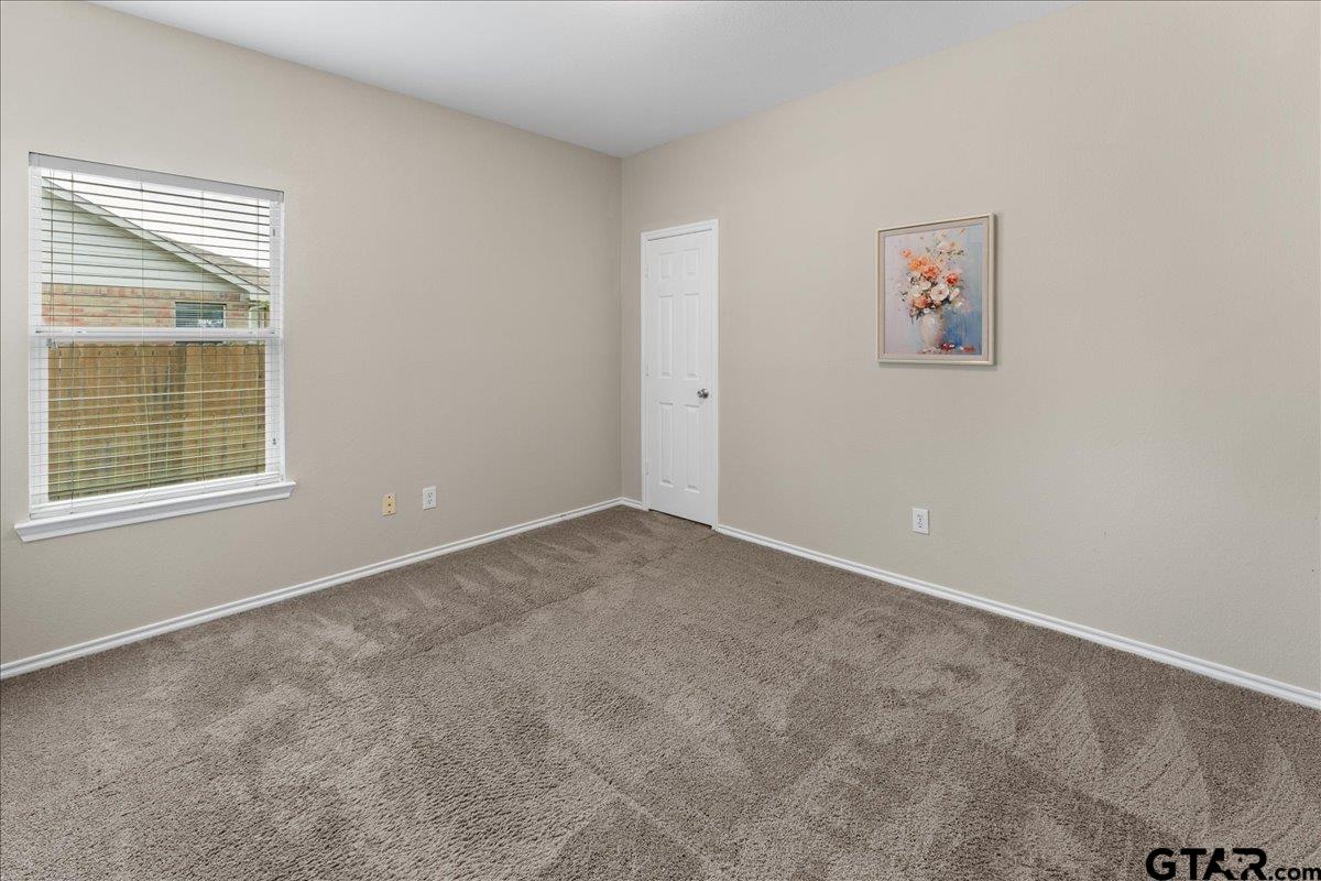 205 Freedom Trail Forney, TX 75126 - Photo 34 of 41 an empty room with windows