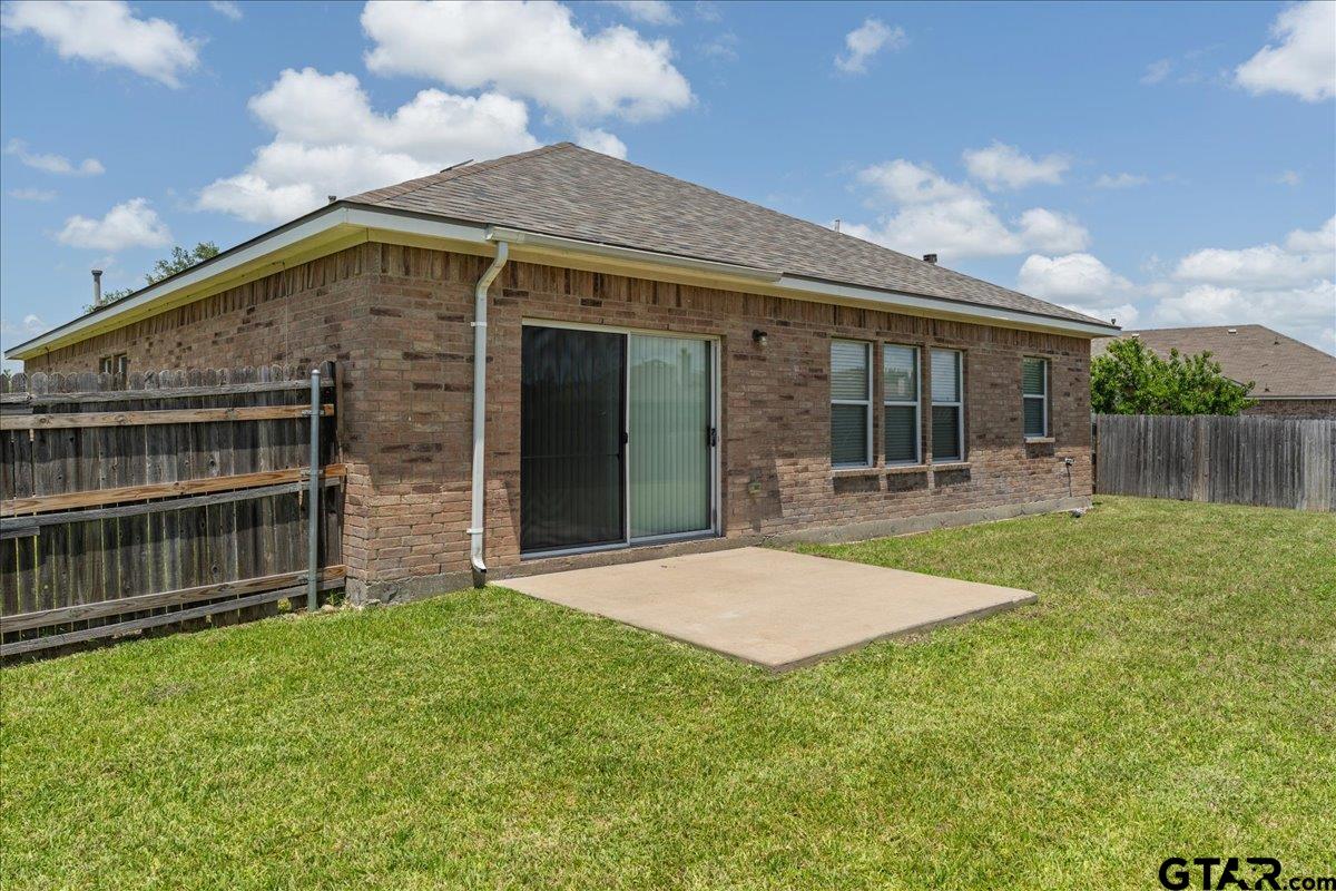 205 Freedom Trail Forney, TX 75126 - Photo 40 of 41 a backyard of a house with lots of green space