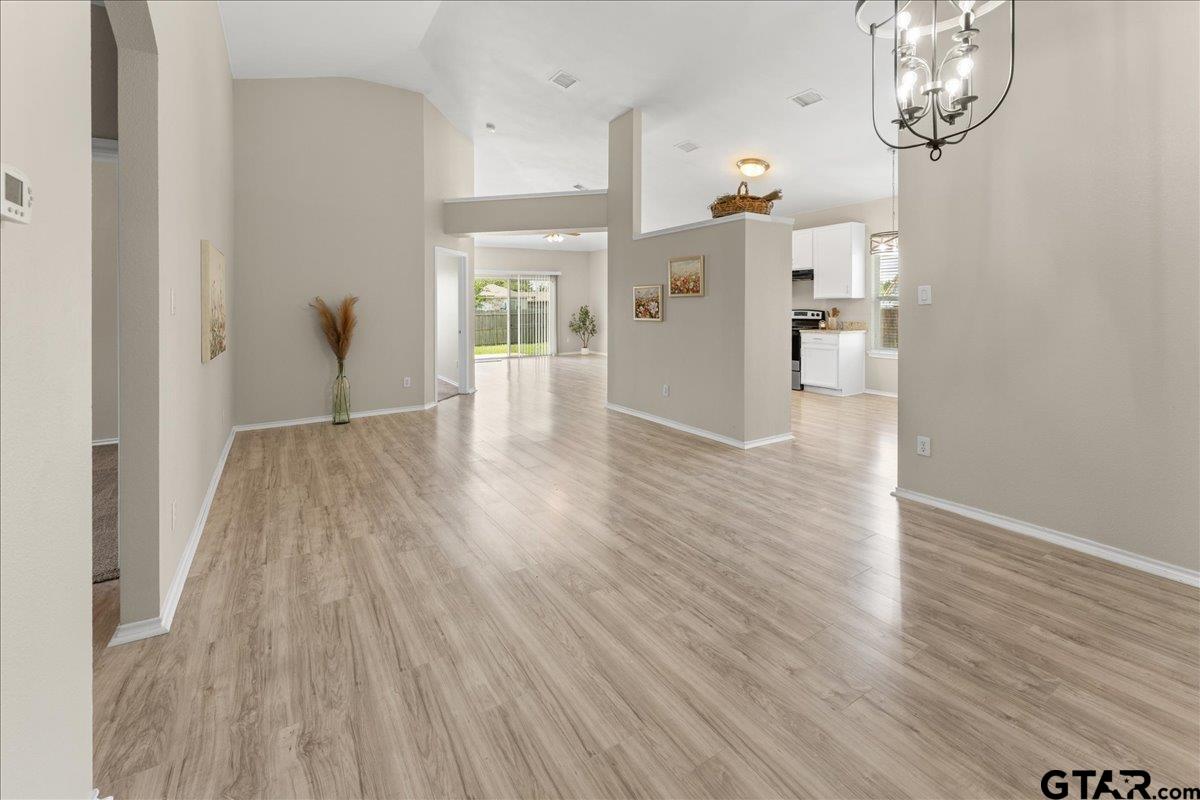 205 Freedom Trail Forney, TX 75126 - Photo 7 of 41 a view of empty room with wooden floor
