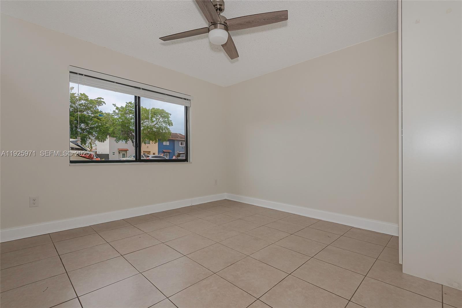 Hialeah Hialeah, FL 33012 - Photo 13 of 27 an empty room with a window