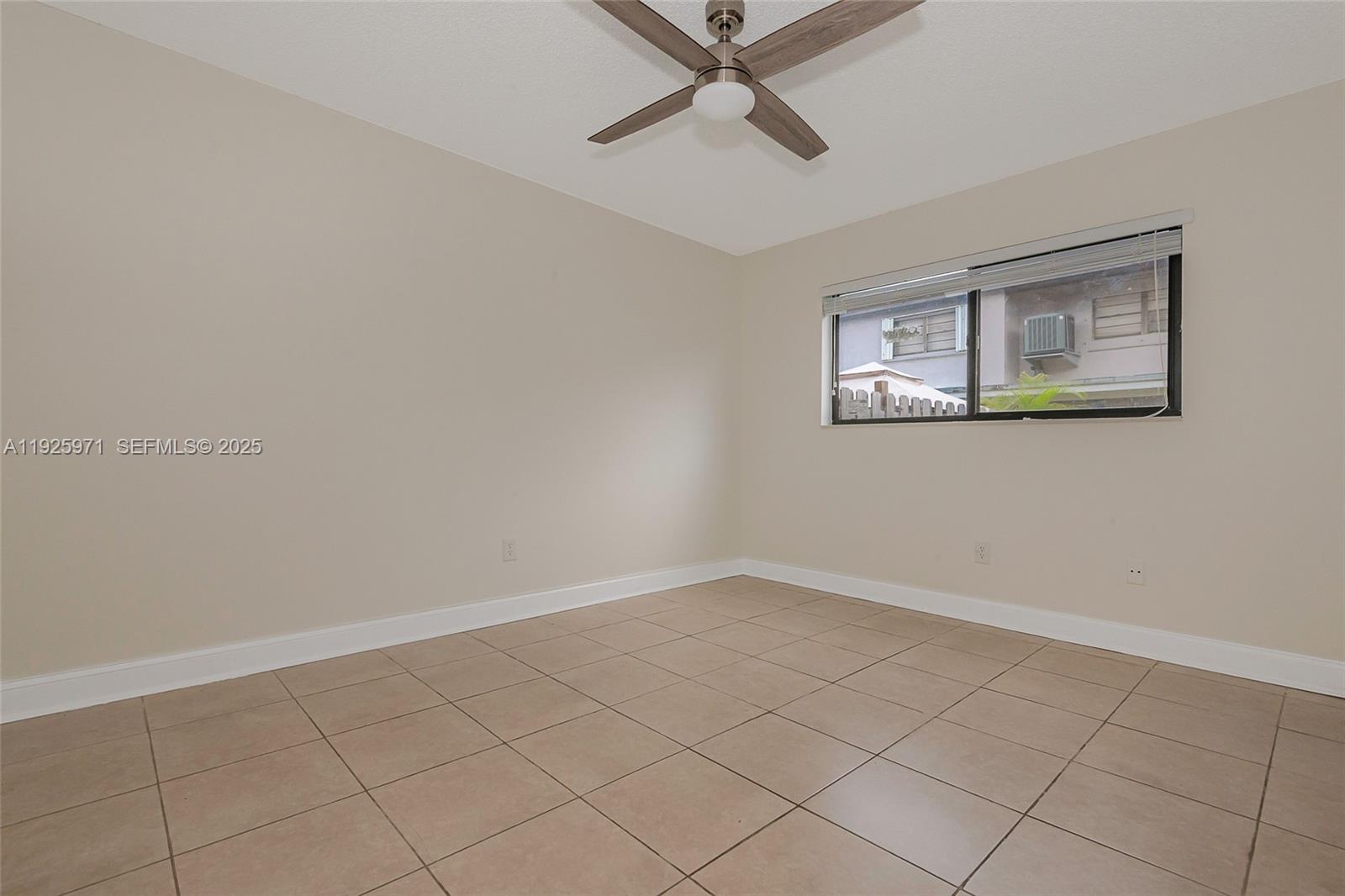 Hialeah Hialeah, FL 33012 - Photo 17 of 27 a view of an empty room with a window