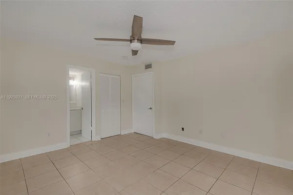 a view of a room with an empty space