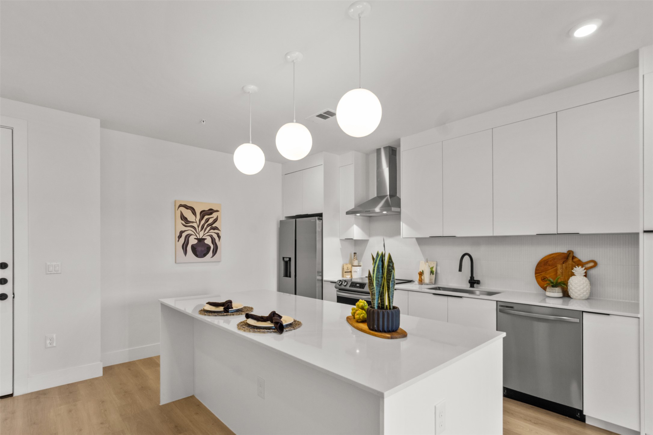 1701 Simond Avenue, Unit 418 Austin, TX 78723 - Photo 4 of 37 Large center island with seating.