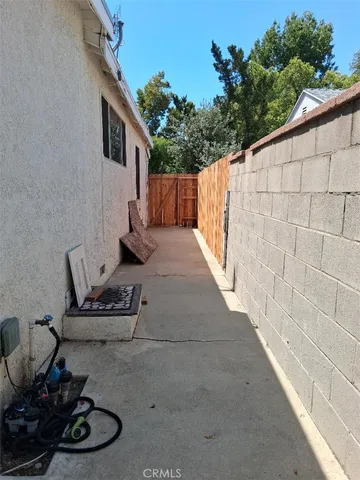a backyard of a house with seating space
