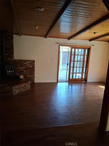 a view of a livingroom with wooden floor
