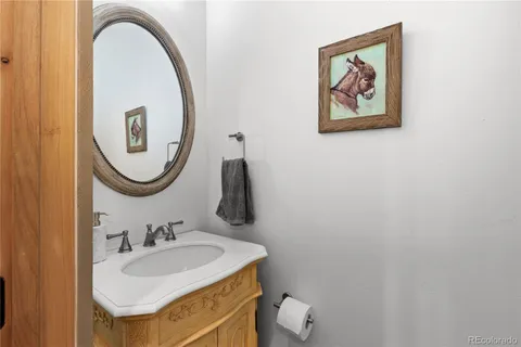 a view of a balcony with wooden floor