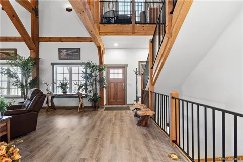 a view of living room with furniture and a porch