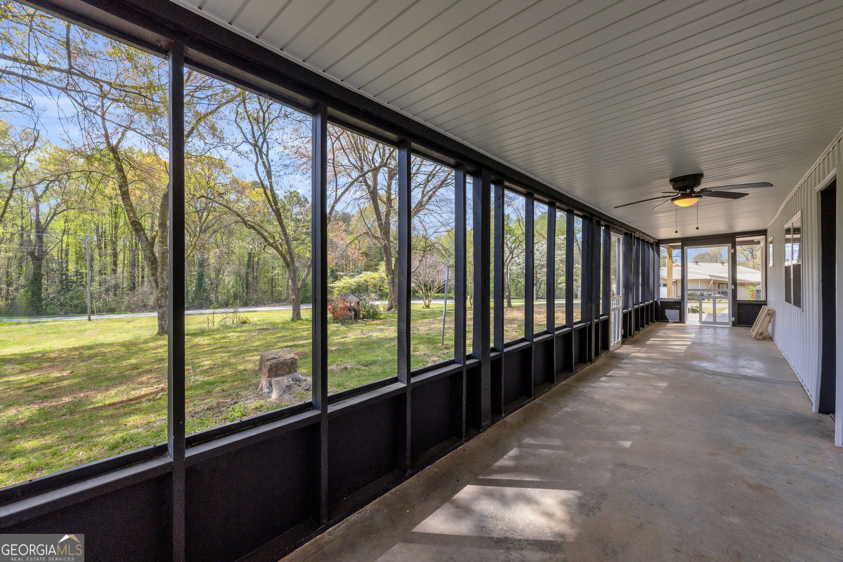 8606 Holly Springs Road Maysville, GA 30558 - Photo 27 of 74 a view of an outdoor space with a large window