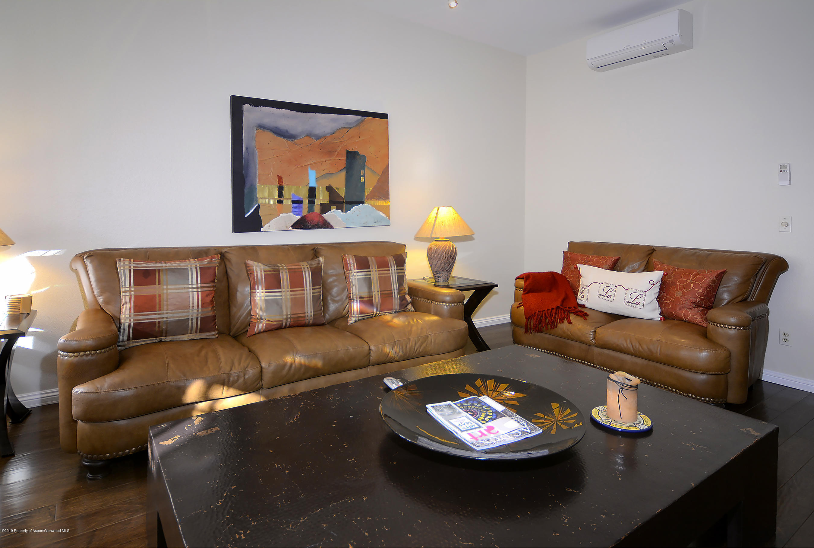 814 East Cooper Avenue Aspen, CO 81611 - Photo 2 of 15 a living room with furniture and a couch