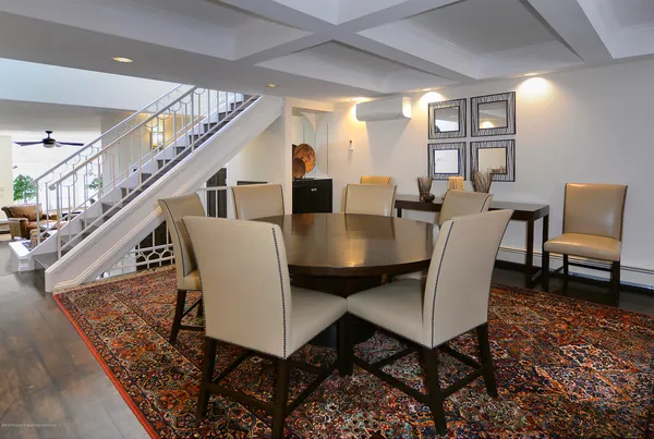 a view of a dining room with furniture