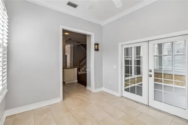 a view of an empty room with a window