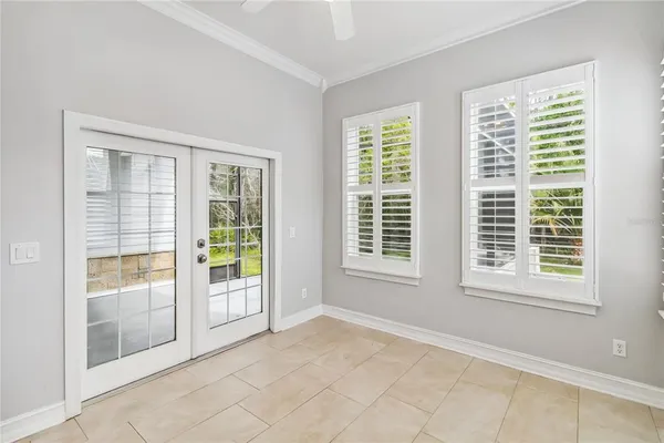 a view of an empty room with a window