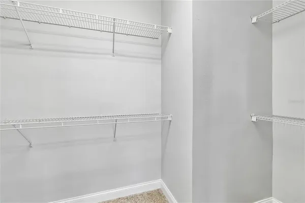 a view of a room with racks on the wall