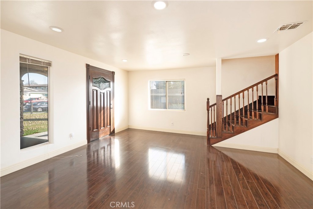 4459 Merced Avenue Baldwin Park, CA 91706 - Photo 11 of 40 a view of an entryway with wooden floor
