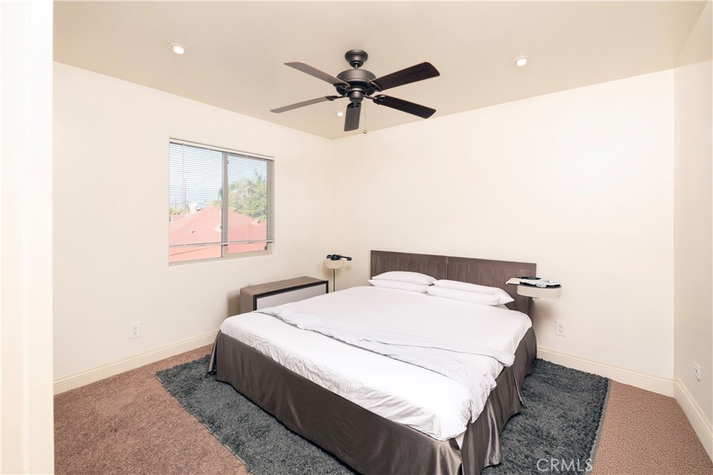4459 Merced Avenue Baldwin Park, CA 91706 - Photo 26 of 40 a bedroom with a bed and window